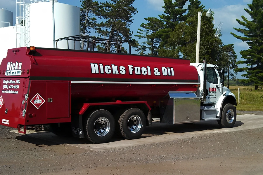 Red fuel truck parked outdoors